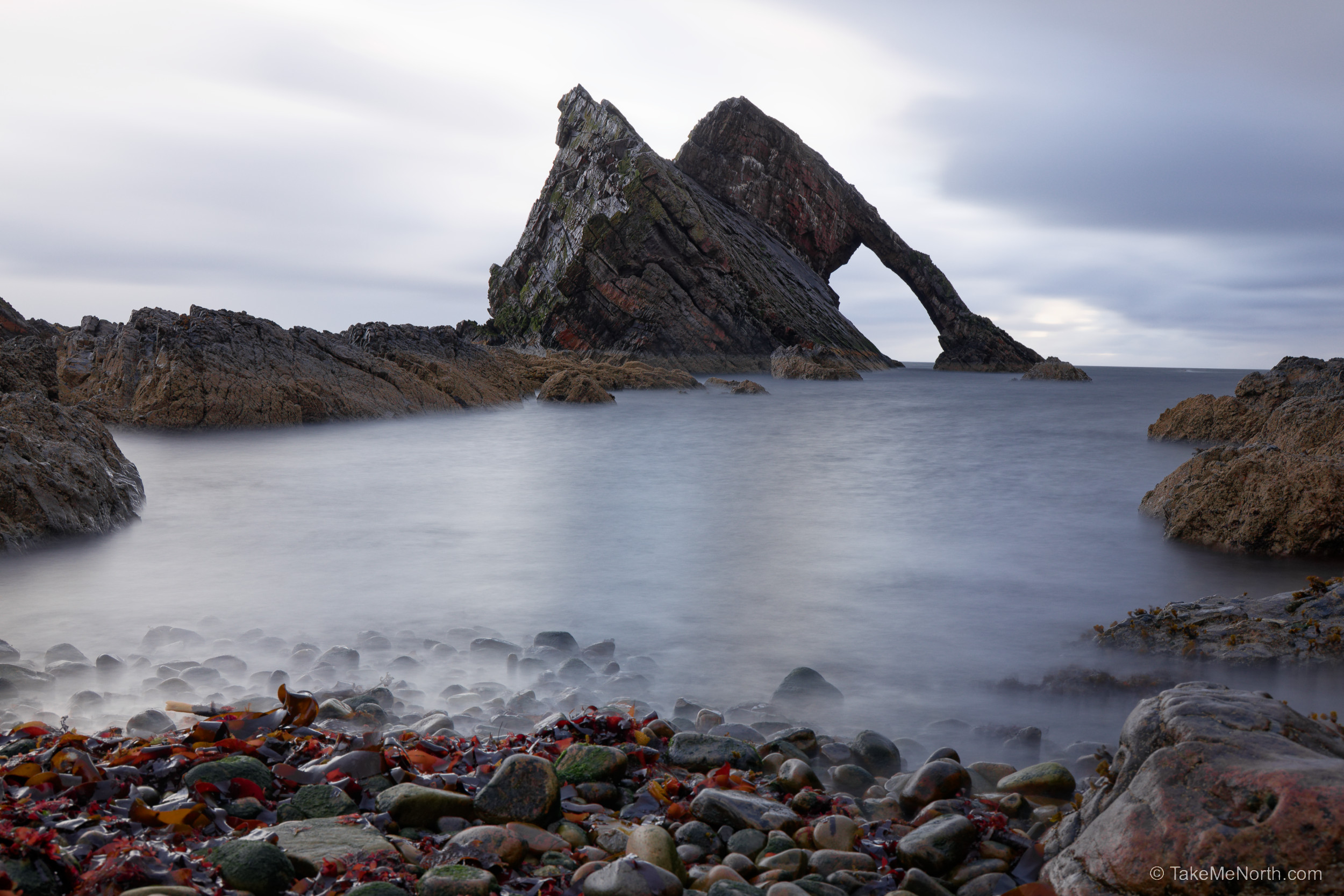 The view at Bow Fiddle Rock from the cobble beach in Portknockie